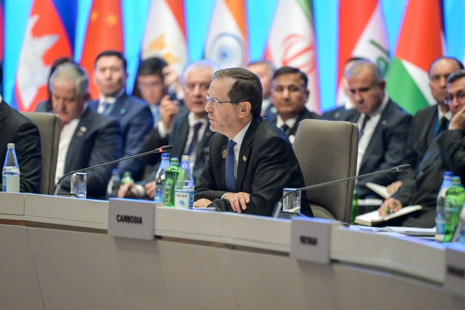 Herzog Calls for Mideast Peace at Summit Attended by Hostiles